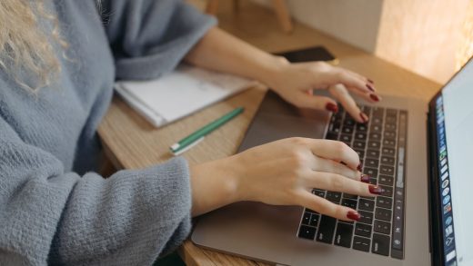 Professional accessing and organising business documents on a computer